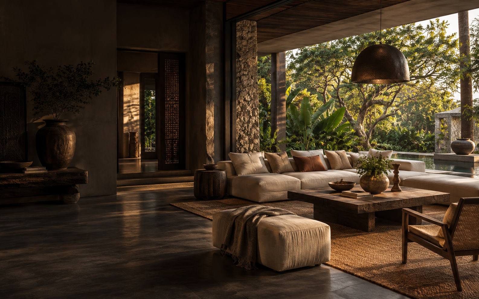 A layered villa lounge opening onto a tropical garden